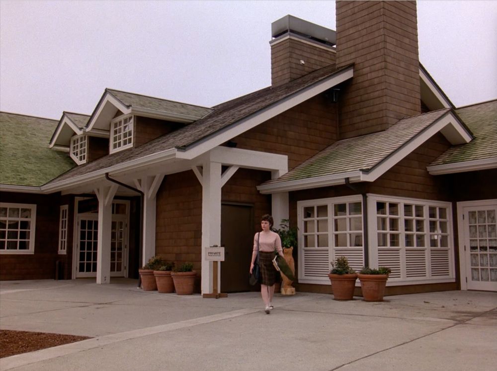 First shot of Audrey Horne, exiting the Horne family’s private residence at The Great Northern hotel. Twin Peaks S01E01 - Northwest Passage.