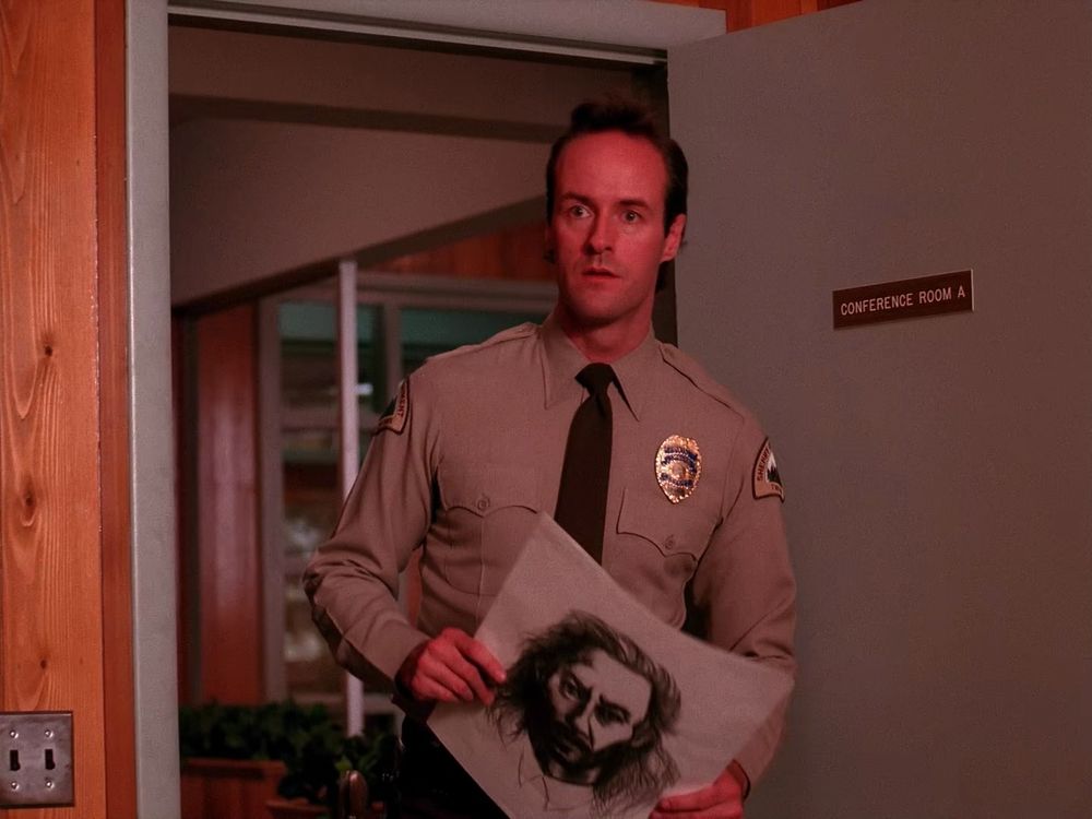 Andy arriving with his sketch of the man Sarah Palmer described. Twin Peaks S01E05 - The One-Armed Man.