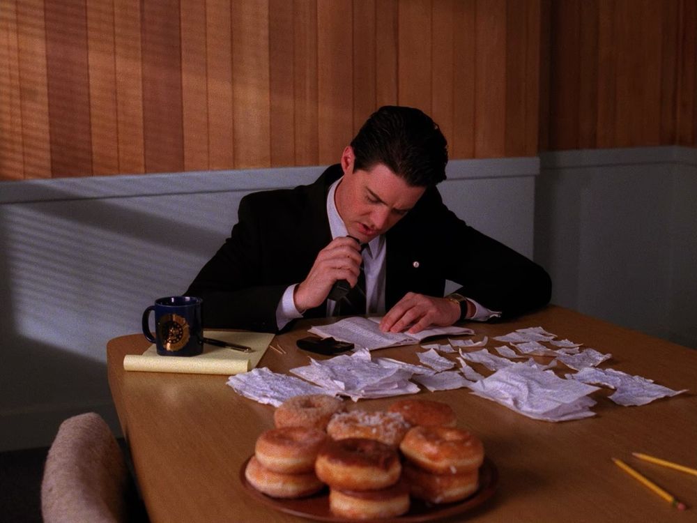 Agent Cooper piecing together Laura’s secret diary. Twin Peaks S02E07 - Lonely Souls.