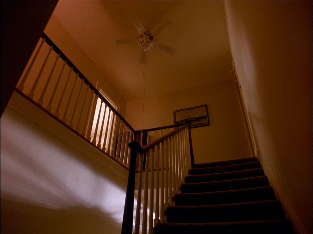 The eerie stairway and ceiling fan at the Palmer house. Twin Peaks S01E01 - Northwest Passage.