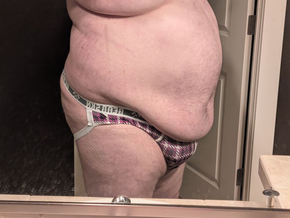 Tano in a jock, side view