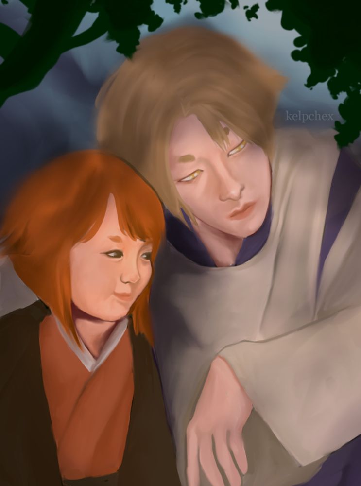 A man and a boy recline under a tree, their heads touching. The boy is smiling.