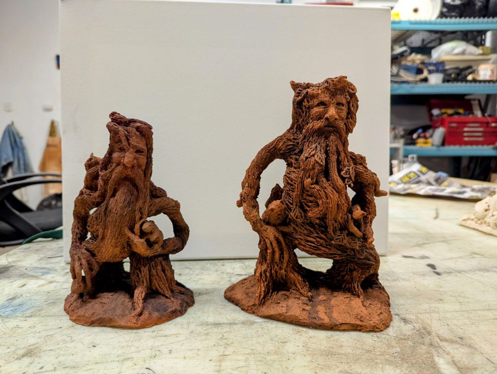 2 Clay Ent statues