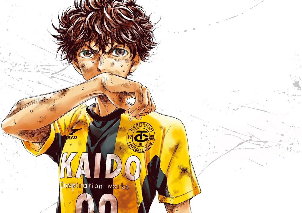 Ashito Aoi, protagonist of the seinen soccer manga and anime by Yūgo Kobayashi and Production IG. He’s a scruffy, lanky-ish kid in his mid-teens, wearing the yellow and black striped, KAIDO sponsored kit for Tokyo Esperion FC. He has a messy mop of dark brown hair and softer brown eyes.