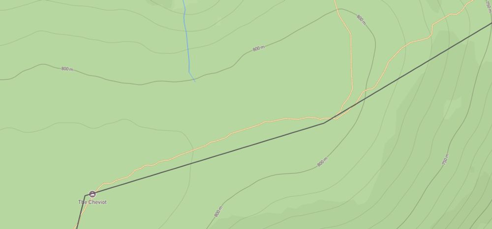 A map showing a straight black line overlaid on a wiggly orange line