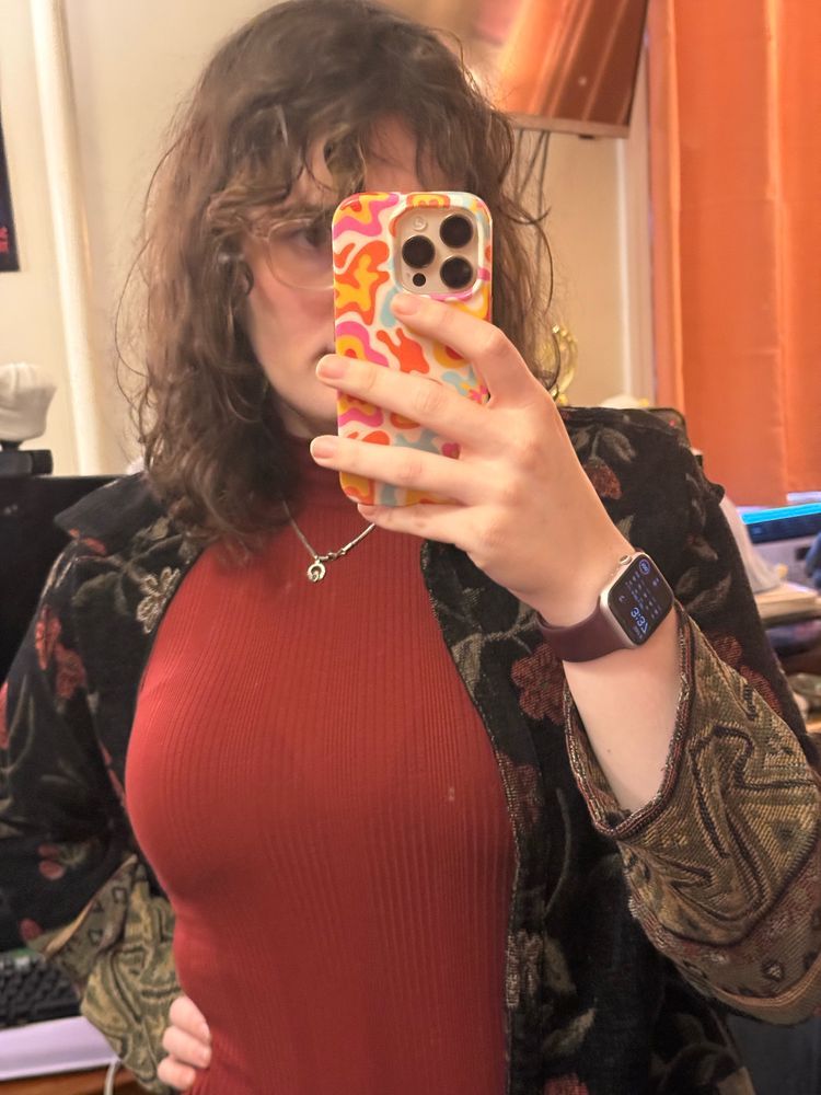 a similar mirror selfie at a closer distance