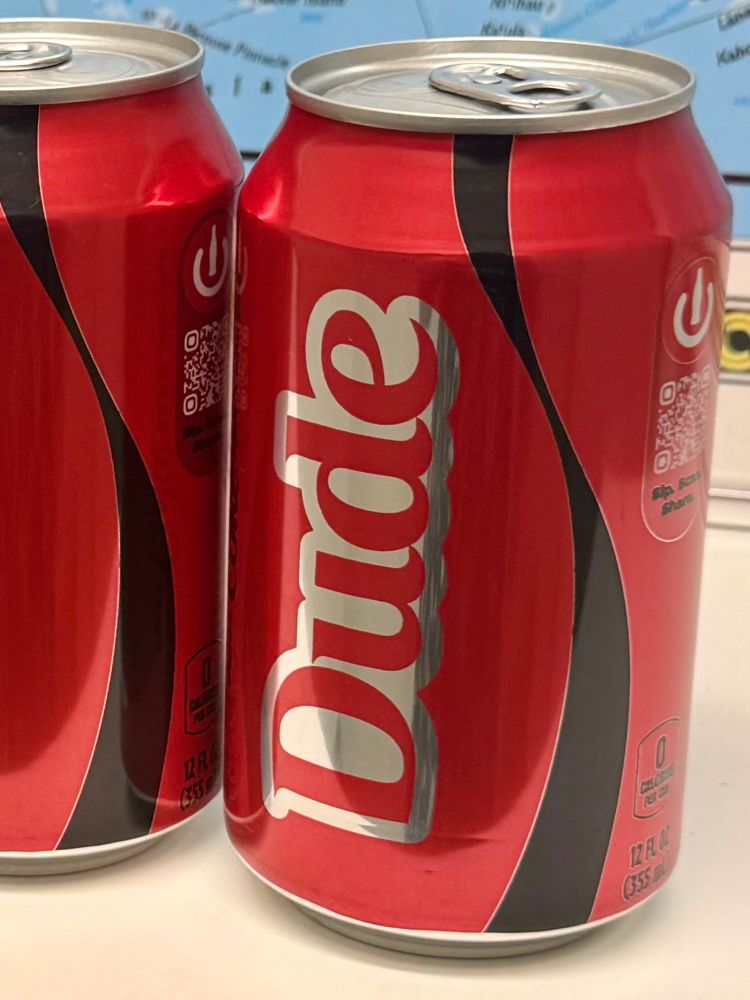 “Dude” in large letters on the side of a red-and-black soda can
