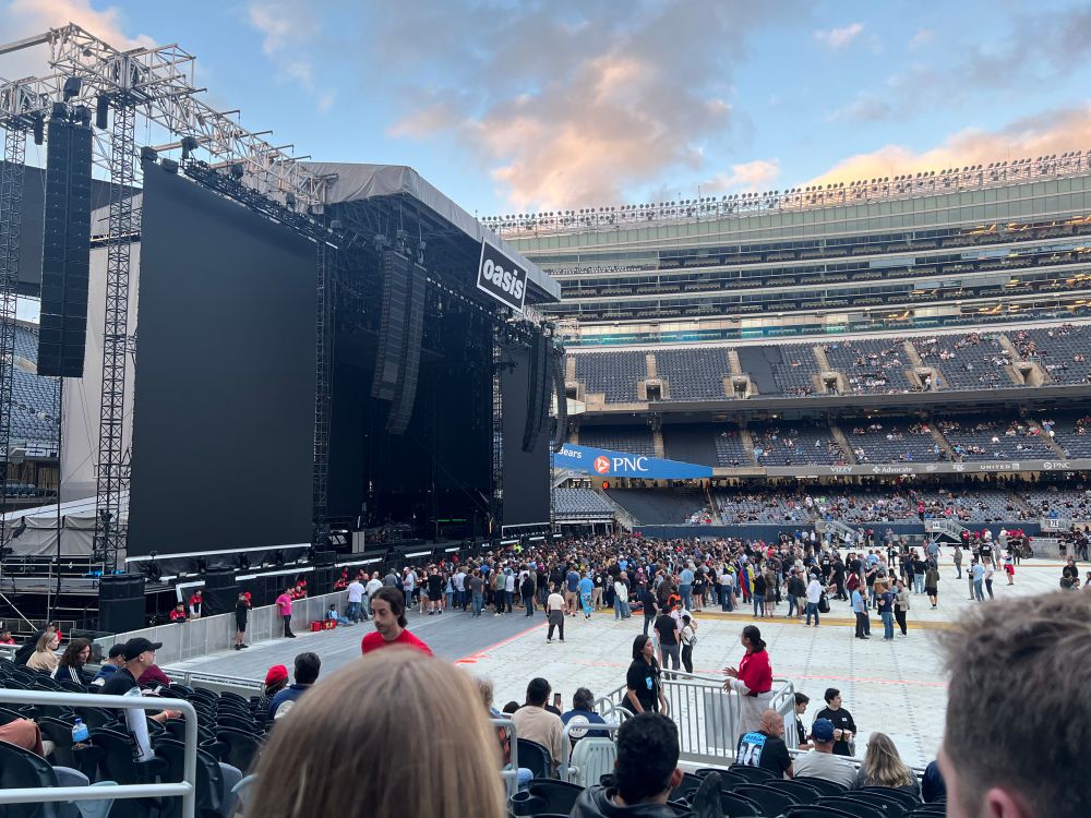 The Oasis stage and gathering crowd at Soldier Field.