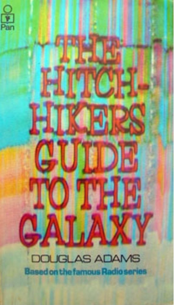 The image shows a picture of the cover of Douglas Adams' book The Hitchiker's Guide to the Galaxy. 