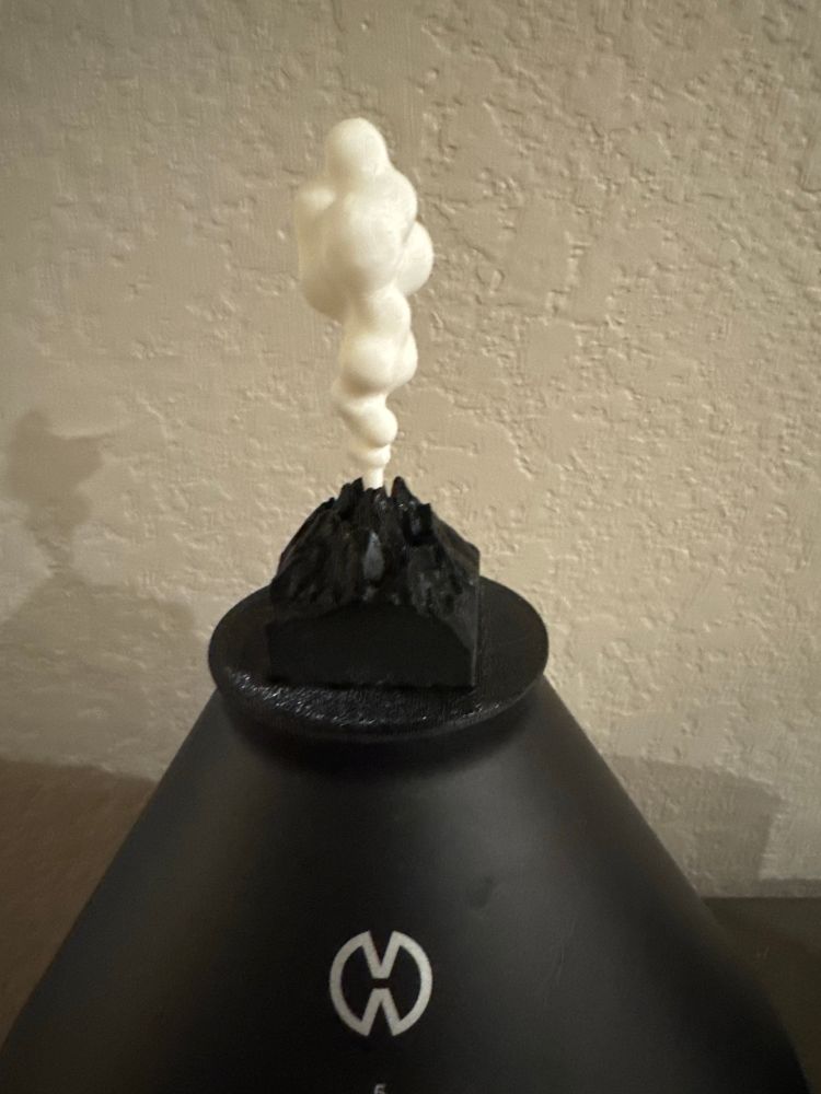 Dust cap for a VaporMed Volcano device that looks like a volcano