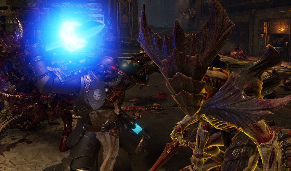 Moments before disaster (for the Tyranid): an Astartes from the Argent Paladins chapter prepares to dispatch a Tyranid warrior.