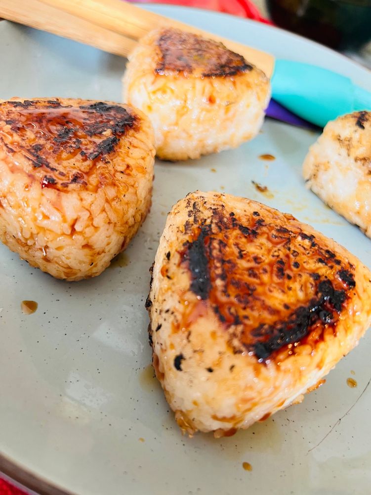 A plate of crispy, delicious yaki onigiri.
