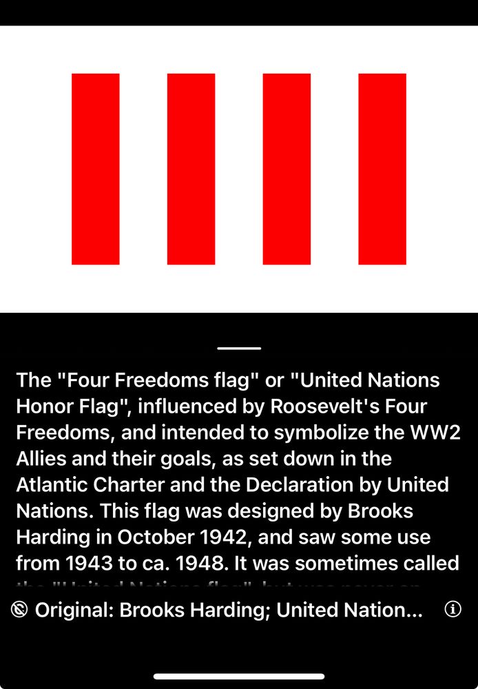 Projected original UN flag with FDR’s “four freedoms” explained below