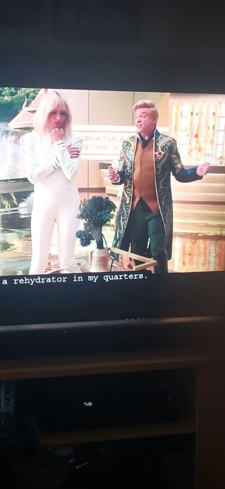 A picture of a tv screen showing Rhys Darby on a recent episode of Star Trek Strange New Worlds