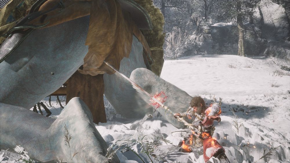 Sun Wukong poking a giant in the butt with his combat stick.