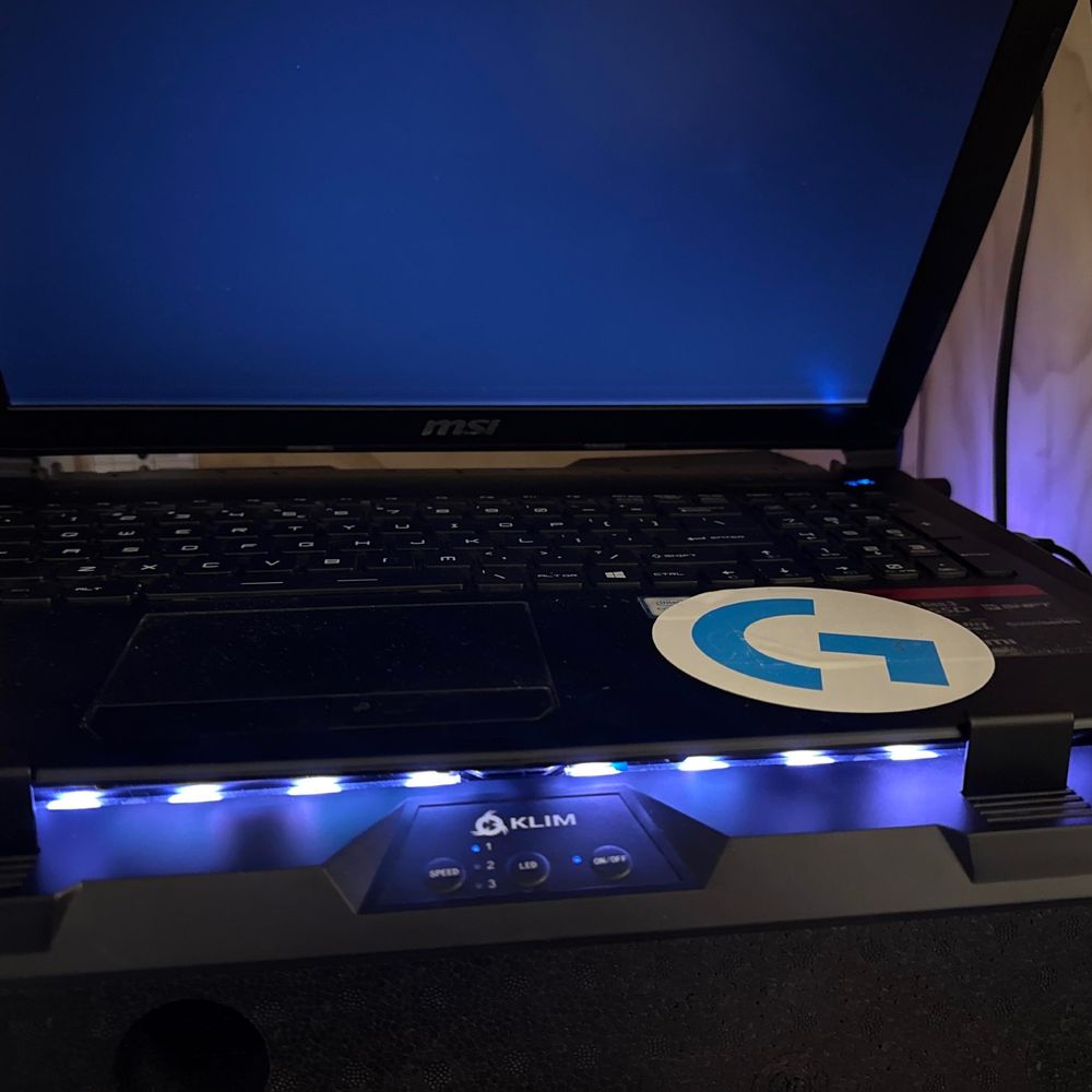 Laptop on top of a cooling pad