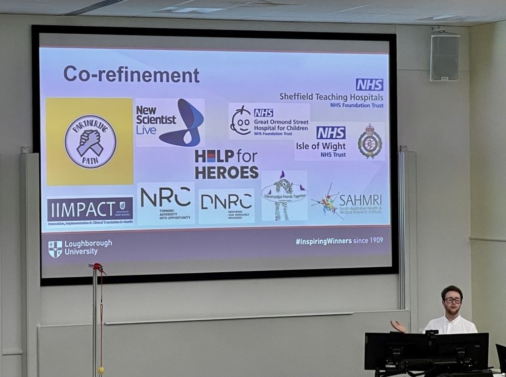 Oscar presenting a slide entitled co-refinement, with logos of relevant NHS, academic, and community groups. 