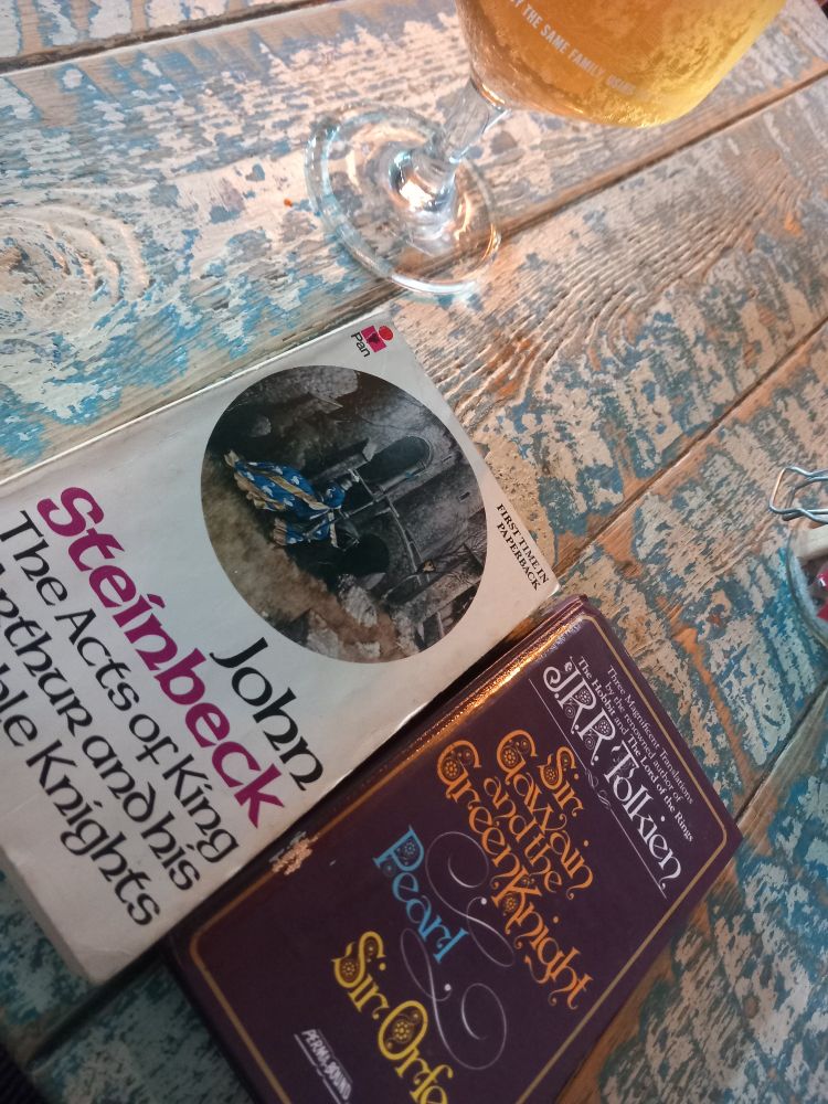 Two books: John Steinbeck's 'the acts of king arthur and his noble knights' and J.R.R.Tolkien's translations of 'Sir Gawain and the Green Knight', 'Pearl' and 'Sir Orfeo'