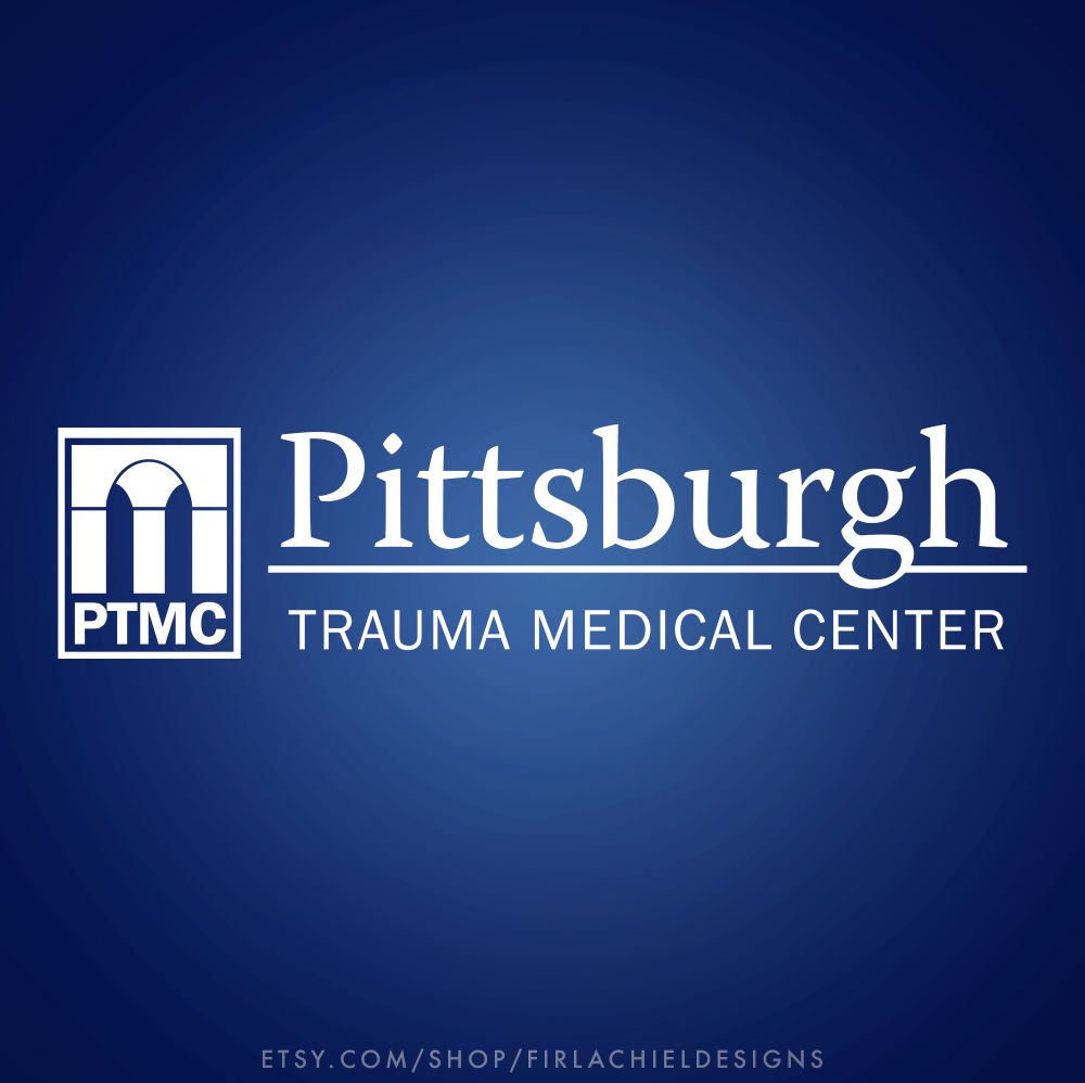 White logo of the fictional Pittsburgh Trauma Medical Center from the show "The Pitt" on blue background