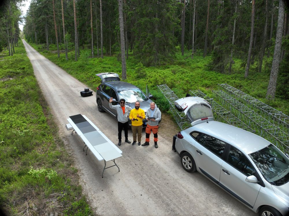 3 researchers standing on forest track in Sweden looking up & smiling at drone 
From left to right: 
Basam Dahy (Postdoctoral Fellow) - Department of Forestry and Wood Technology, Linnaeus University 
Pavel Tsybenko (drone pilot) - DRONARISS /Katam Technologies
Johan Fransson (Professor Digitalisation in Forestry) - Department of Forestry and Wood Technology, Linnaeus University 