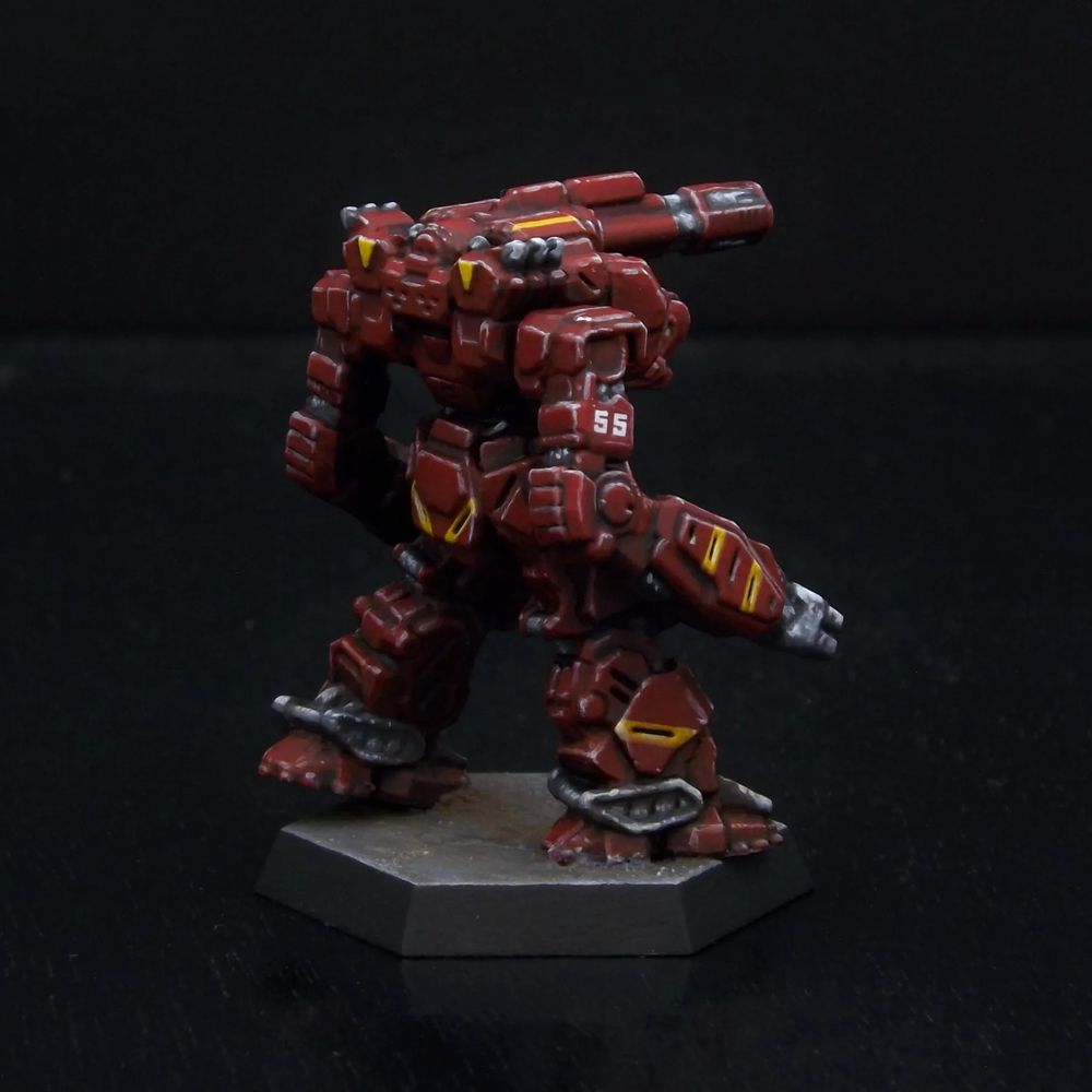 A painted miniature of a Legionnaire 'Mech.  It is dark red with yellow stripe highlights.  The number "55" is on the right upper arm.
