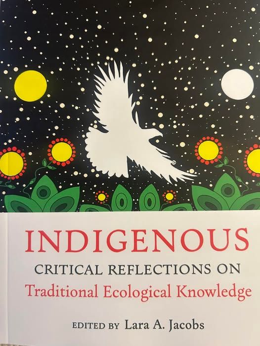 Image ID: Personal photograph of a text titled INDIGENOUS CRITICAL REFLECTIONS ON TRADITIONAL ECOLOGICAL KNOWLEDGE, edited by Lara A Jacobs. 

Description from the editor, Lara Jacobs'
@ecohugger.bsky.social: "It was written by over 50 Indigenous Peoples from around the world and contains stories, poetry, and  critical thought pieces on how TEK is used and extracted from our communities and what folks are doing to protect it."