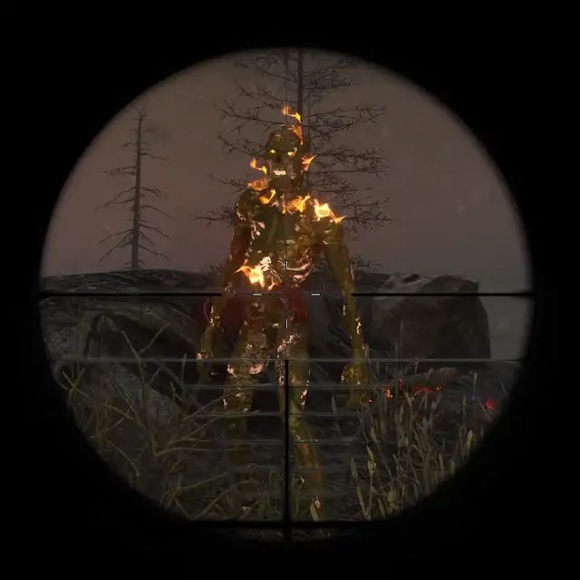 Looking down the sights of a gun at a zombie on fire