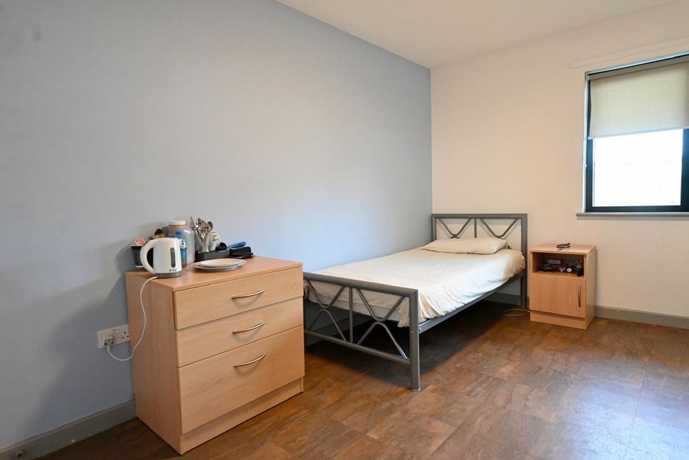 Photo of one of bedrooms of St Mungo’s No Second Night Out Assessment centre. 