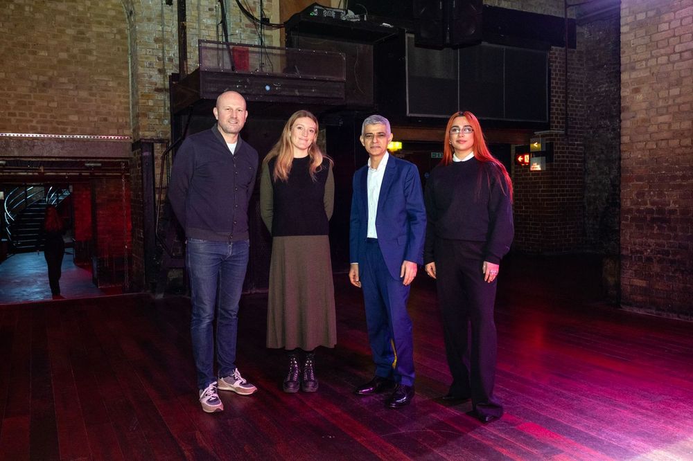 Group photo of Mayor of London Sadiq Khan and representatives of Fabric London inside the nightclub.