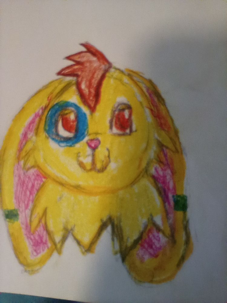 A headshot of a yellow lopbunny with a blue spot on L eye and orange eyes and hair. 