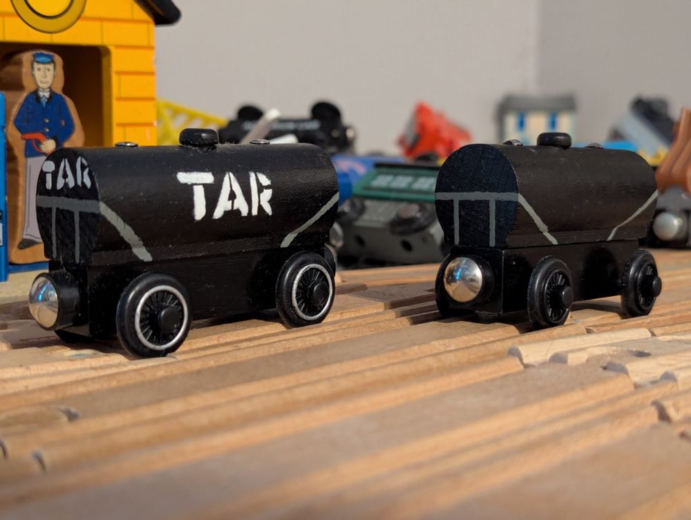 Two custom TWR tank wagons, one in a tar livery (which was done first), and the other in a plain black livery, which was done a few days ago