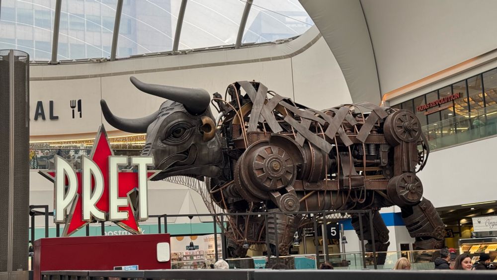 The Bull statue in Birmingham New Street station. Taken at an angle to look like he’s about to have a coffee from Pret.