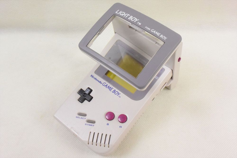 A Light Boy attached to a Game Boy