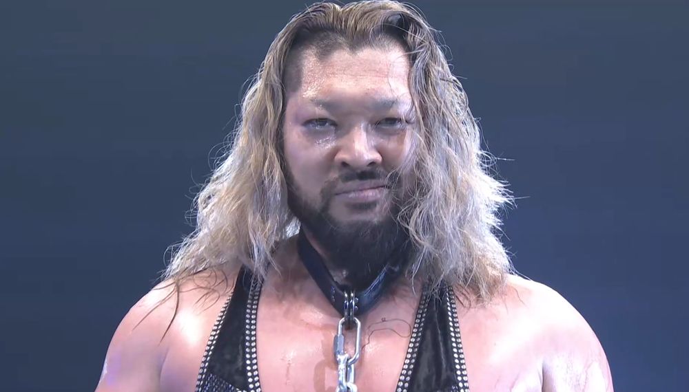 A screenshot of EVIL after he beat David Finlay in their dog collar match.