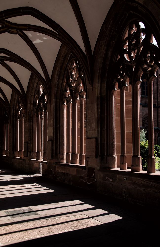 Sunlight through stone arches 