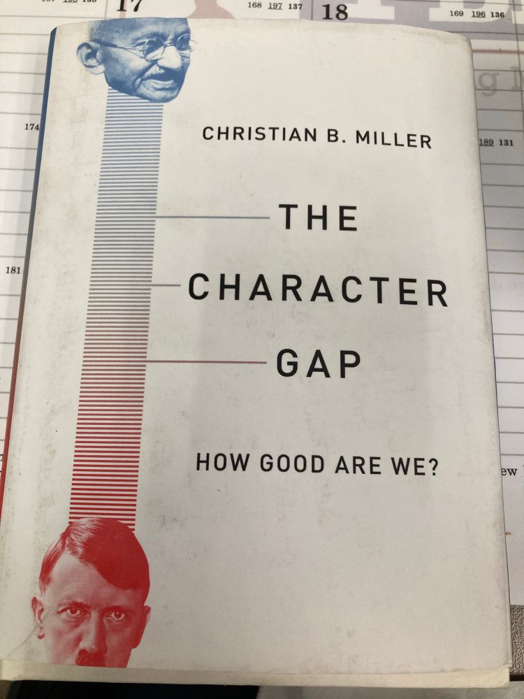 Picture of The Character Gap: How Good Are We? by Christian Miller. Cover has a thermometer like scales on the left going from red at the bottom to blue at the top, but the endpoints are Hitler on the bottom in red and Gandhi on the top in blue.