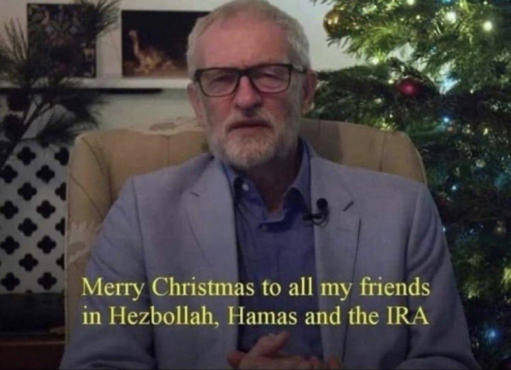 Picture of Jeremy Corbyn in front of a Christmas tree with caption “Merry Christmas to all my friends in Hezbollah, Hamas and the IRA”