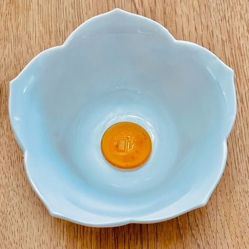 Astrologian Soul Crystal sitting in a small flower bowl