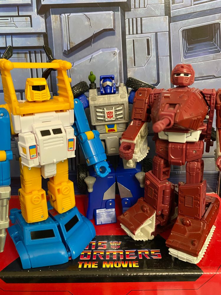 Three robot best friends kicking it 