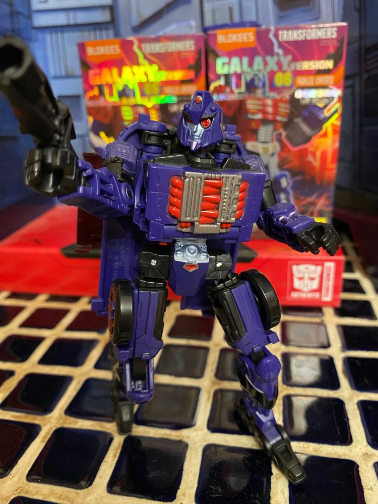 A purple robot with red accents 