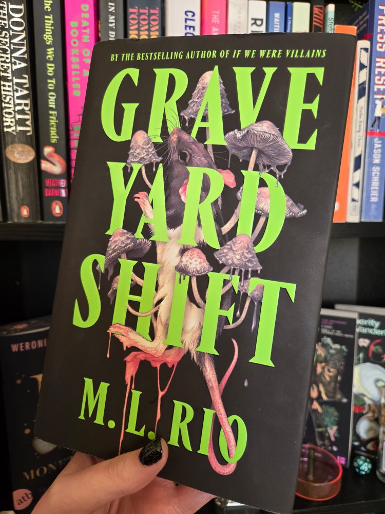 Cover of Grave Yard Shift book in front of bookcase
