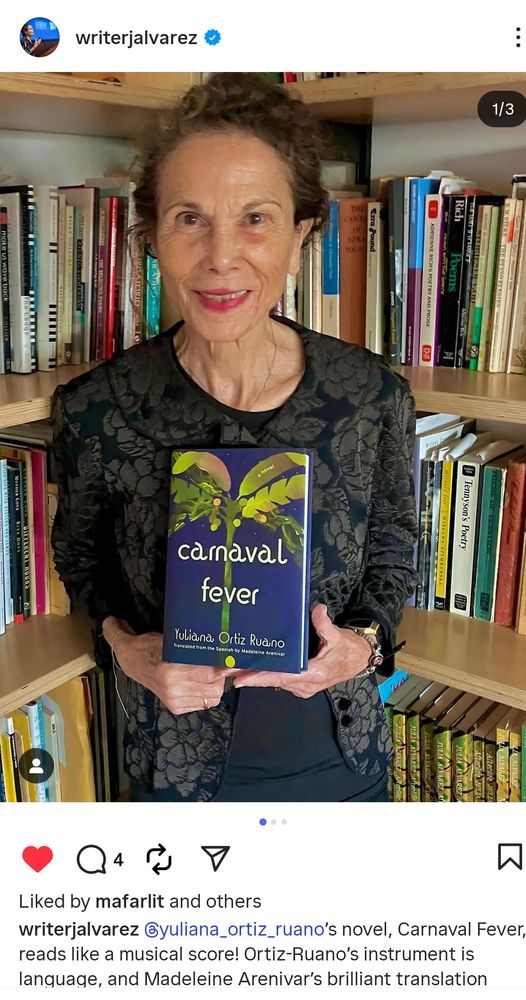 screenshot of an instagram post by author Julia Alvarez. she is holding a copy of "Carnaval Fever," a newly-released novel by Yuliana Ortiz Ruano, translated by Madeleine Arenivar (my sister!)