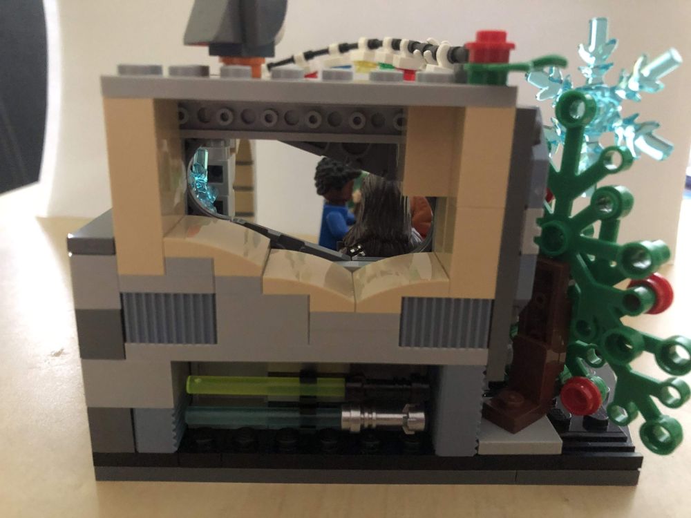 The back of the diorama, showing a bunk bed with a storage space beneath for two lichtsabers, although held by the blade... Let's not think too hard on that, and enjoy the holiday season.