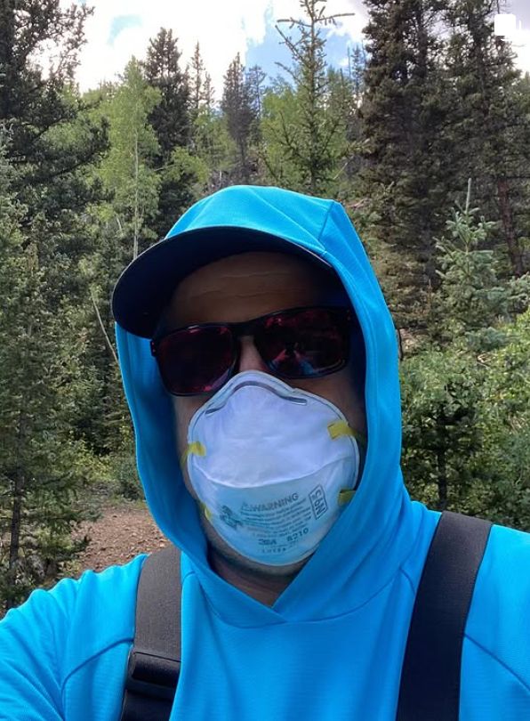Streamside selfie of me with a facemask on to avoid inhaling chemical fumes 