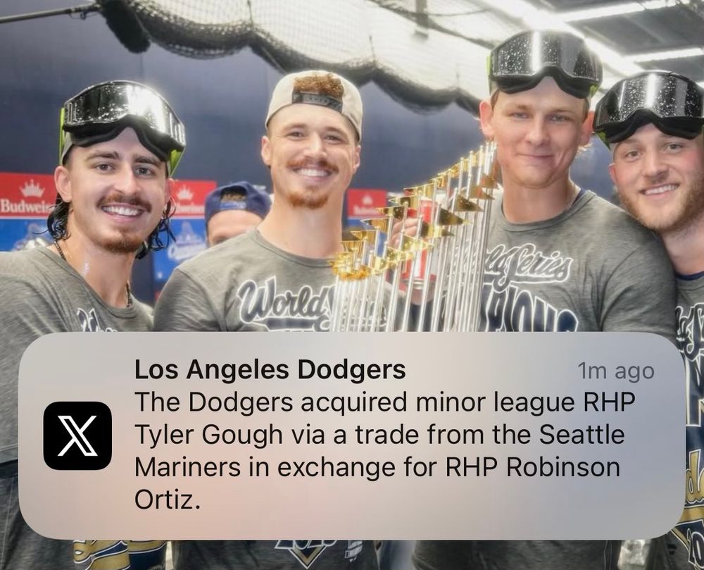 The screen shot features a tweet from the Dodgers that says they’ve traded for Tyler Gough, not Scott Gough. Very excellent photo of Justin, Jack, Emmet and Ben as my Lock Screen wallpaper on my personal phone. 
