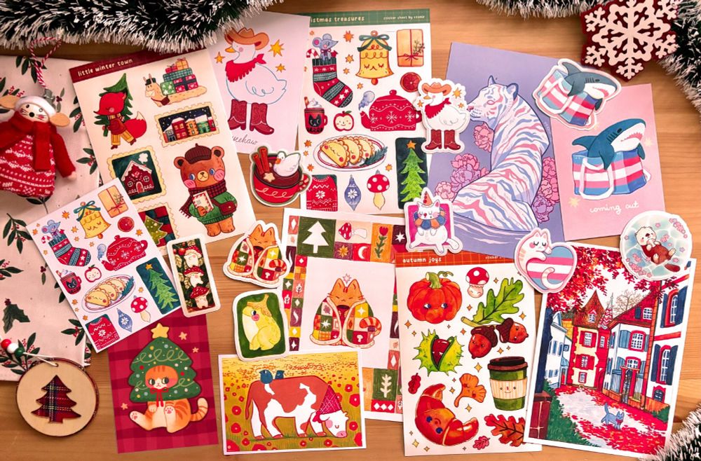 Picture with a variety of things from my shop such as stickers, postcards and prints 