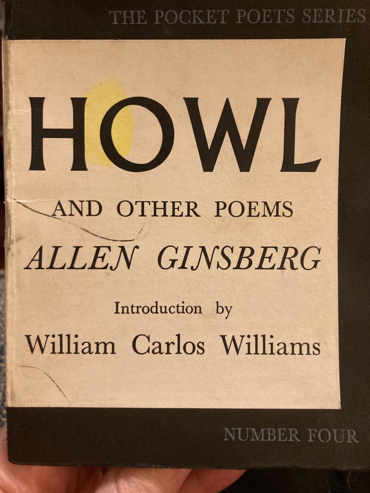 Cover of Howl in the classic Pocket Poets design: black border around a white background, black text. HOWL in that unmistakable City Lights font.