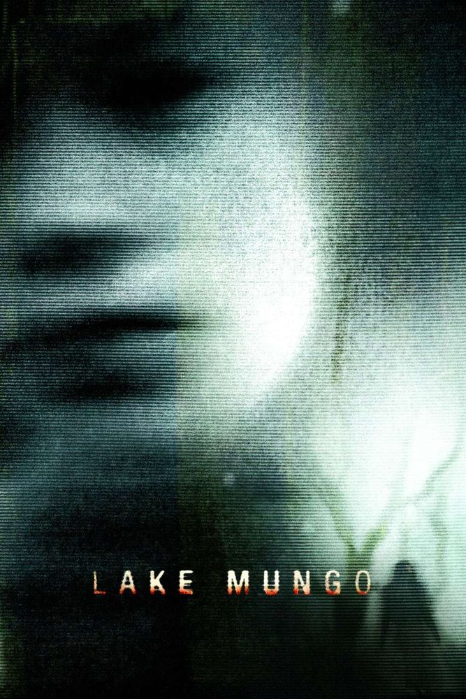 Poster for Lake Mungo. The design features a distorted, ghostly face emerging from a dark, textured background with a faint ripple effect. The title ‘Lake Mungo’ is displayed in eerie, faded text at the bottom, creating a haunting and unsettling atmosphere.