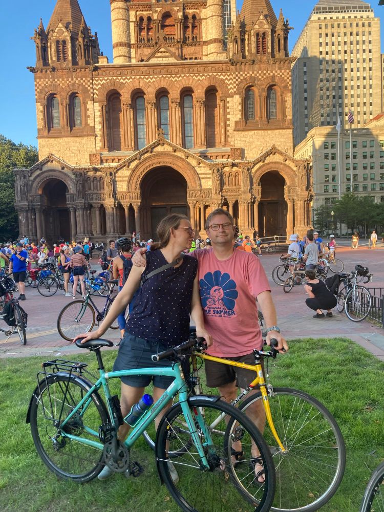Annie and Carl with bicycles in Copley Sq, Boston. 