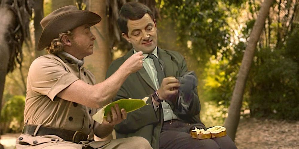 Instead of helping pick food debris out of Ed's beard, Stede tries to feed some snake snack to Mr. Bean, who doesn't notice. He is busy trying to make a sandwich on his lap, wearing one glove.